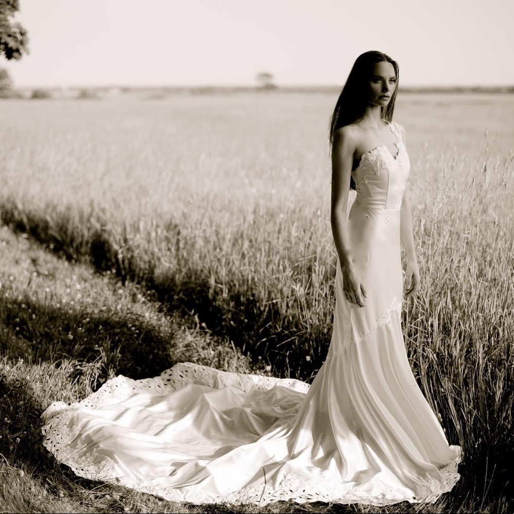 Gorgeous satin wedding dress with very long train
